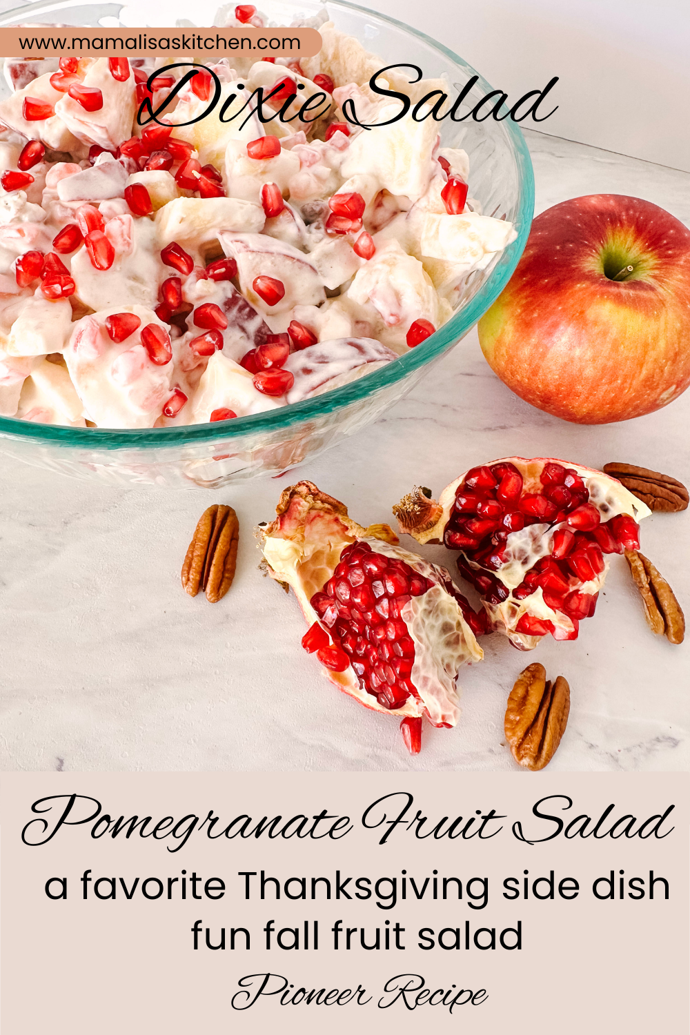 Bowl of fruit salad with pomegranates, an apple, and pecans on the table